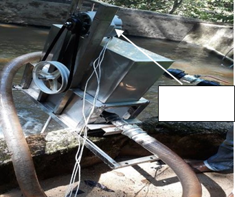 Custom designed micro-hydro Pelton wheel for green technology power energy source at the Retention Pond No. 1