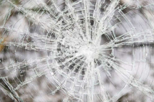 A grid of cracks on the non-hardened glass obtained by a hit