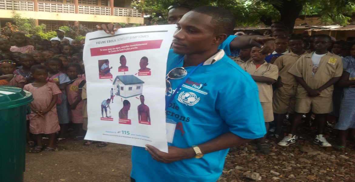 UNICEF and partners doing an education session about Ebola in a school
